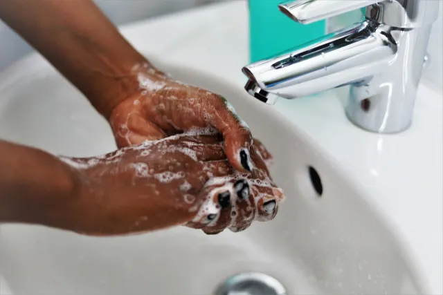 Handen wassen